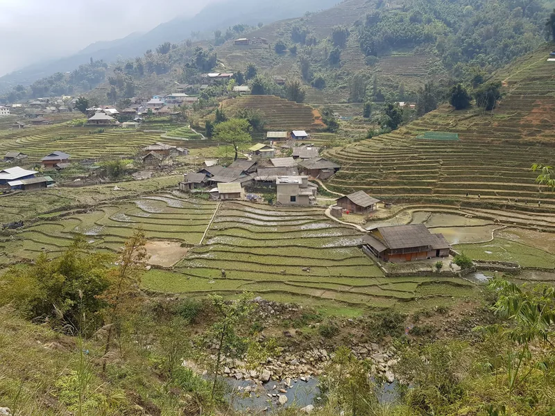 Terraced rice fields surround a small village in the Muong Hoa valley near Ta Van, Sapa. Terraced rice fields surround a small village in the Muong Hoa valley near Ta Van, Sapa.